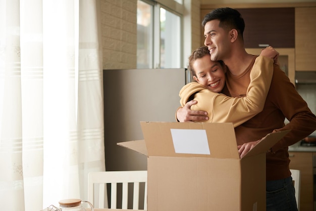 Photo couple receiving a longawaited package