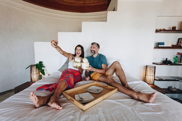 Couple relaxing on the bed