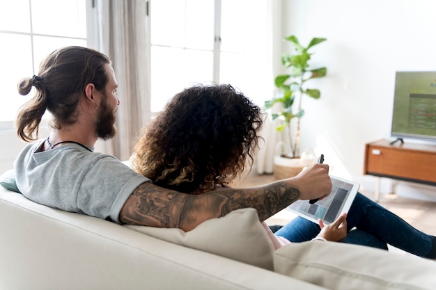 Couple relaxing at home