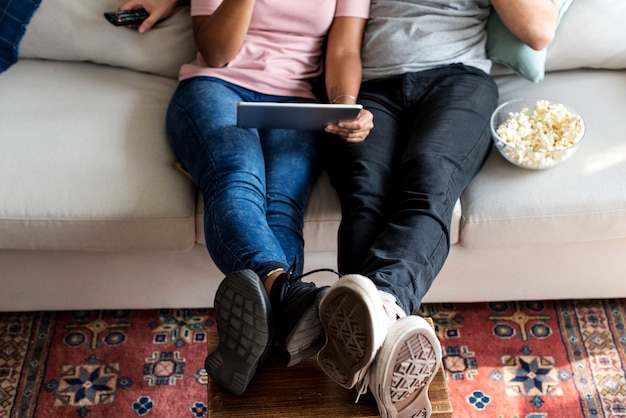 Couple relaxing at home