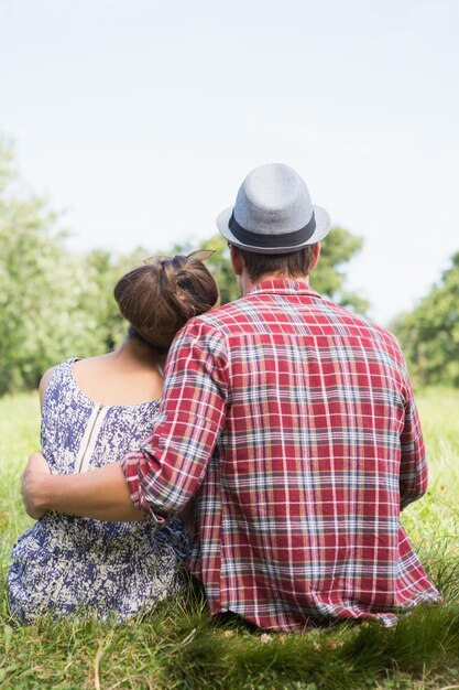 Couple relaxing in the park on a sunny day