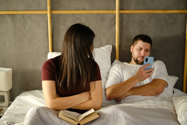 Couple resting on bed