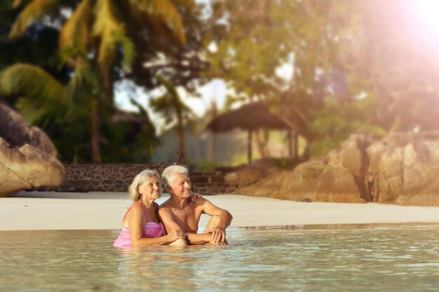 Couple resting at tropical beach