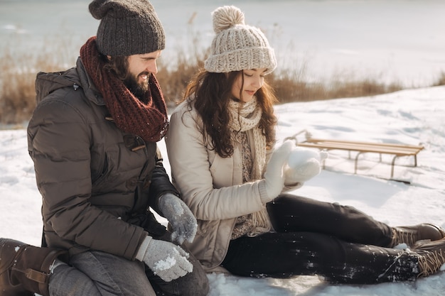 Couple Resting in Winter Holidays Outdoors