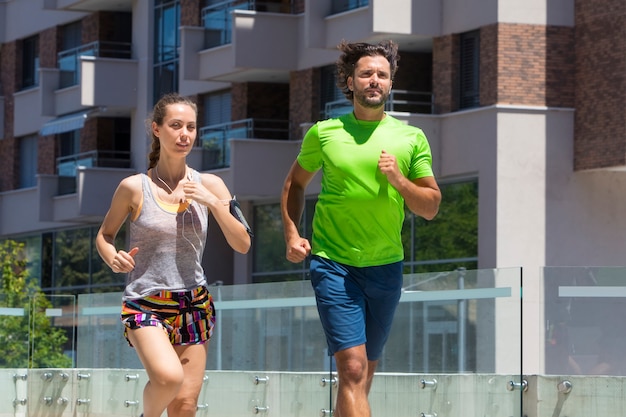 Couple running in urban enviroment