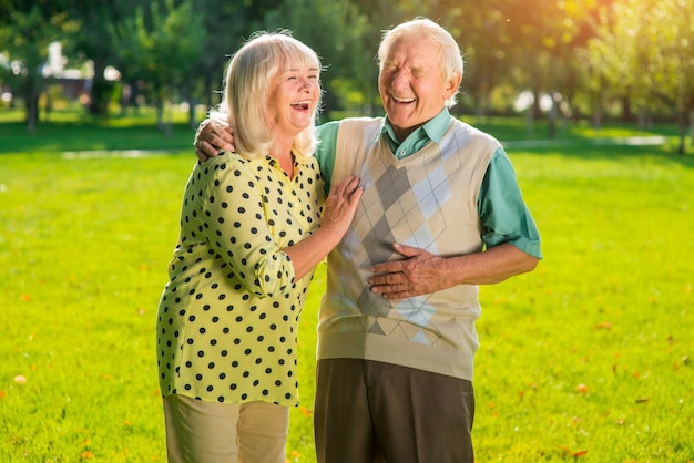 Couple of seniors laughing.