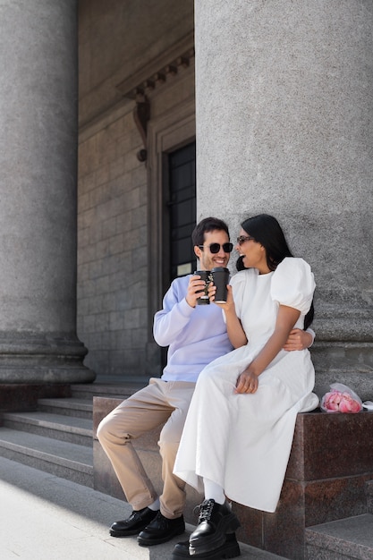 Couple sharing tender public intimacy moments