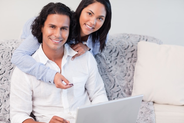 Couple shopping online together