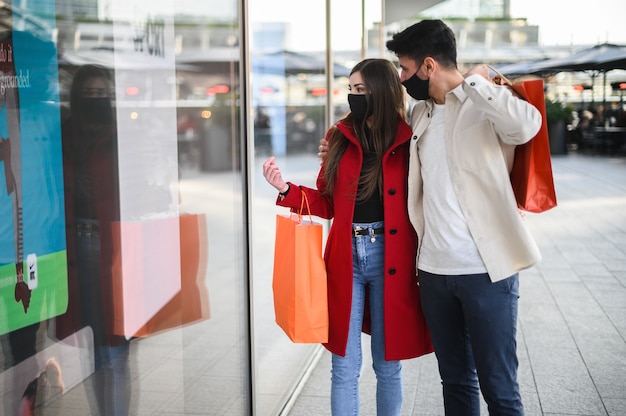 Couple shopping in an urban street