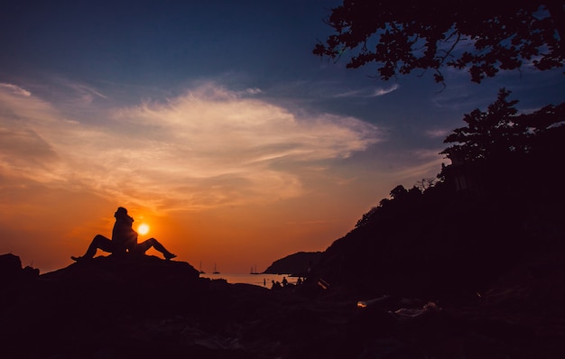 Couple sitting on the beach