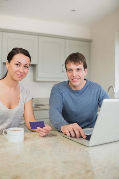 Couple sitting in the kitchen