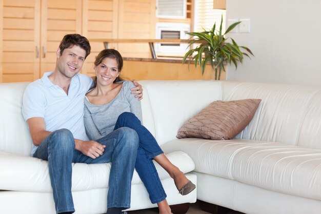 Couple sitting on a sofa