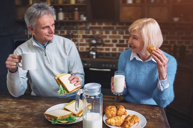 Couple sitting at a table in the kitchen