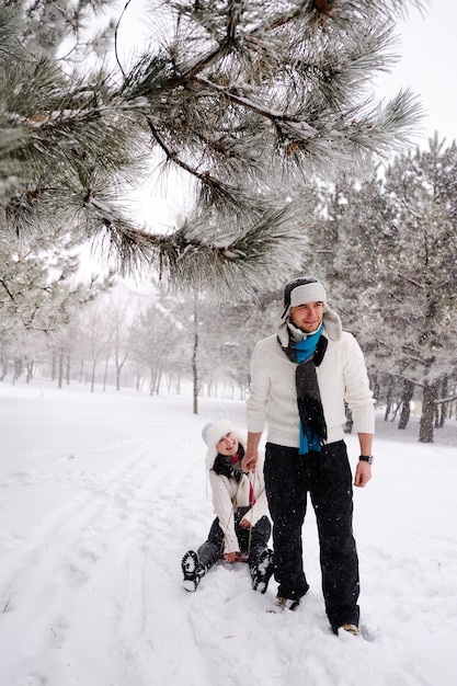 Couple sledding