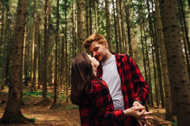 Couple spending time together in the woods