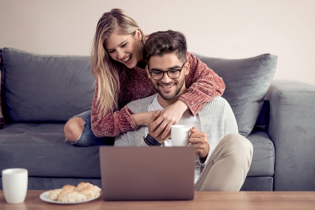 Couple surfing internet together