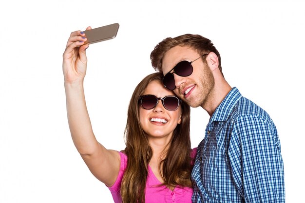 Couple taking selfie with smart phone