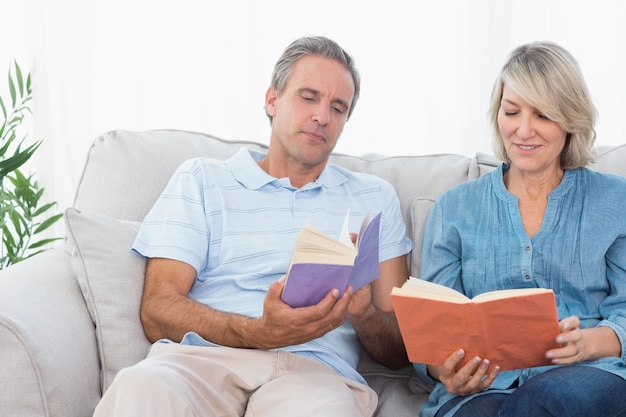 Couple talking about their books