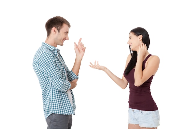 Couple talking arguing on each other isolated