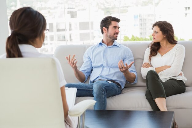 Couple talking with their therapist