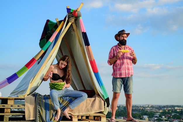 Couple in tent. Pair in love camping. Summer vacation.