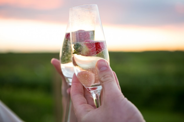  couple toasting glass of champagne