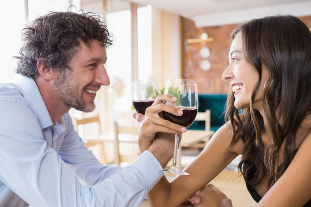 Couple toasting glasses of champagne