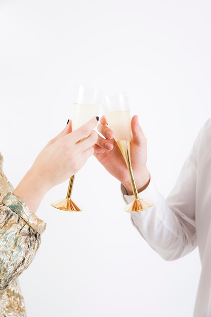 Couple toasting glasses of champagne