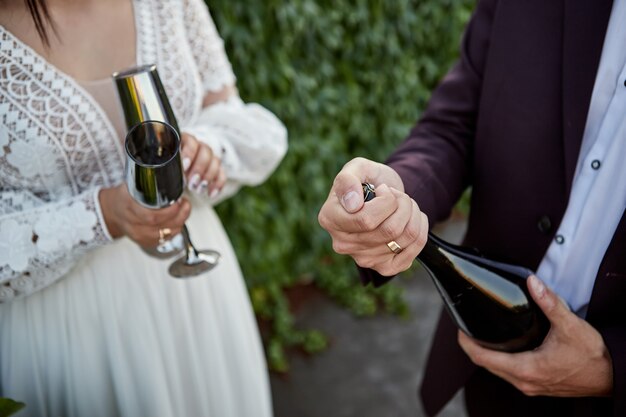 Couple toasting wine glasses for celebration