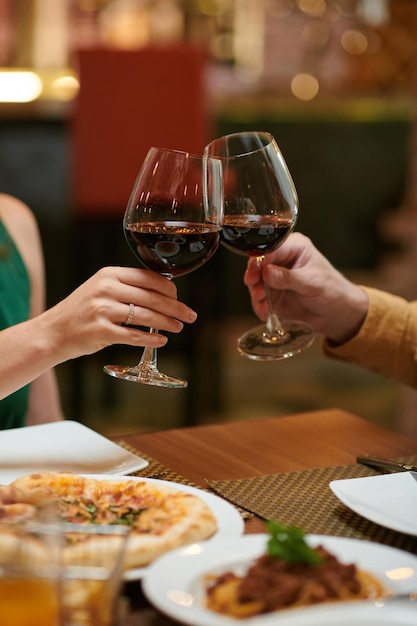 Couple Toasting with Glasses of Wine