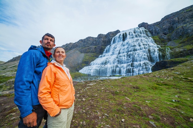 Couple of tourists and Dynjandi Iceland