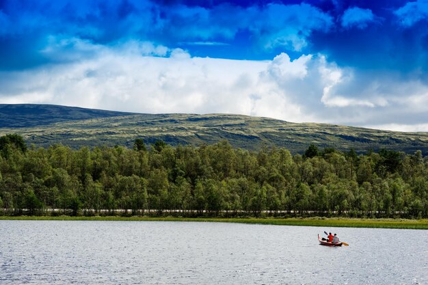 Couple of tourists swimming in boat background hd