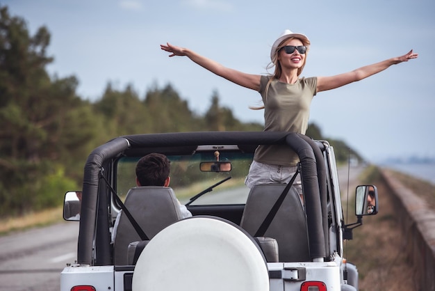 Couple travelling by car