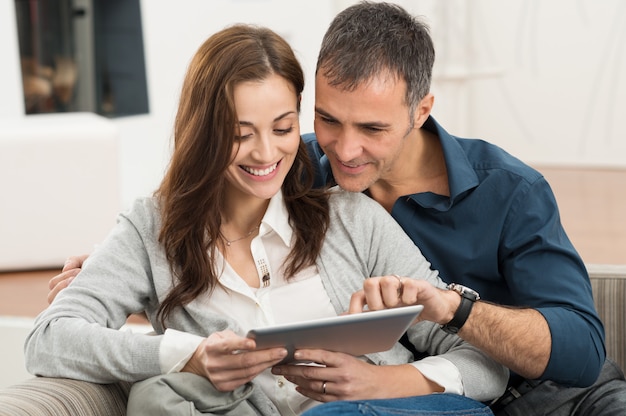 Couple Using Digital Tablet