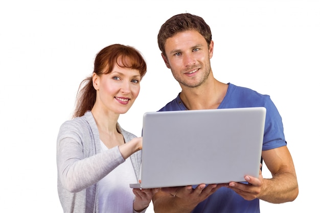 Couple using a laptop together