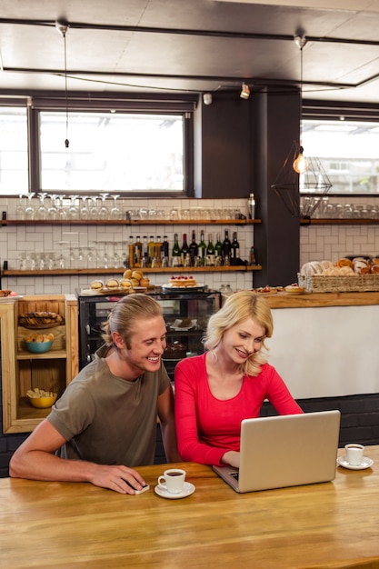 Couple using a laptop