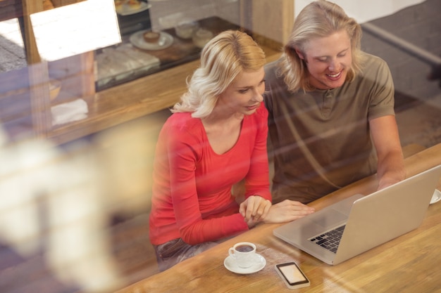 Couple using a laptop