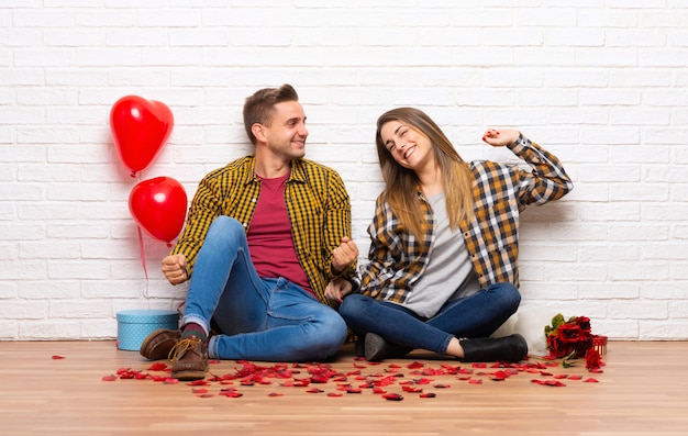 Couple in valentine day at indoors enjoy dancing while listening to music at a party