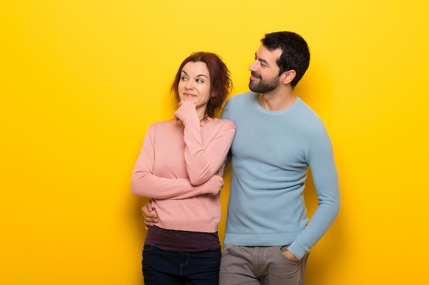 Couple in valentine day looking to the side