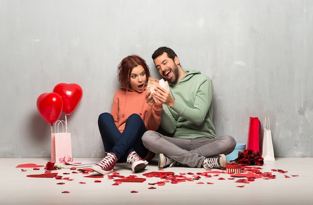 Couple in valentine day taking a lot of money