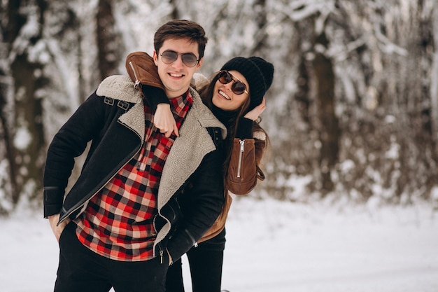 Couple on valentine's day in winter forest