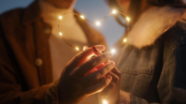 Couple valentines day in the night with led strip lights