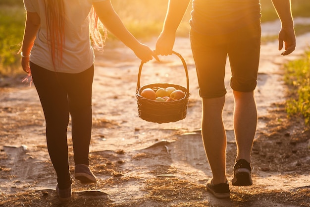 Couple walk informal meadow picnic love concept. Hiker lifestyle. Together on the nature.