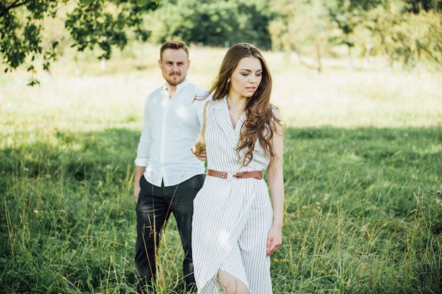 Couple walking in garden