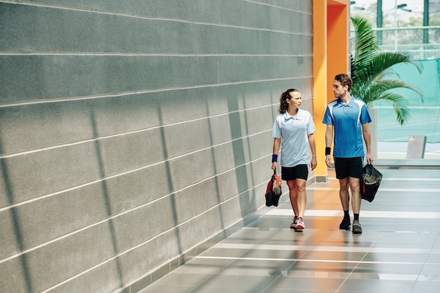 Couple walking home after training