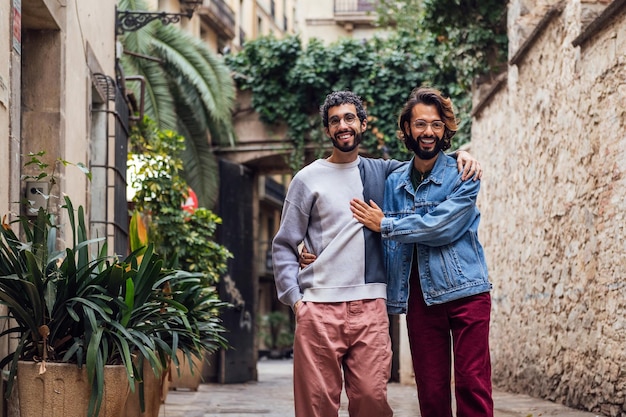 Couple walking laughing and showing affection