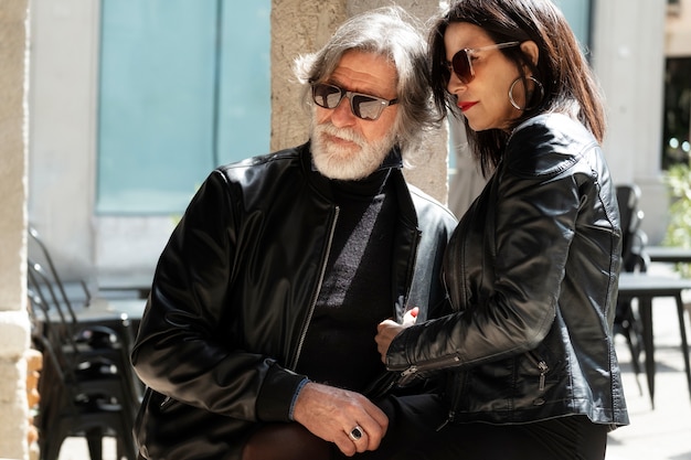 Couple wearing synthetic leather clothing