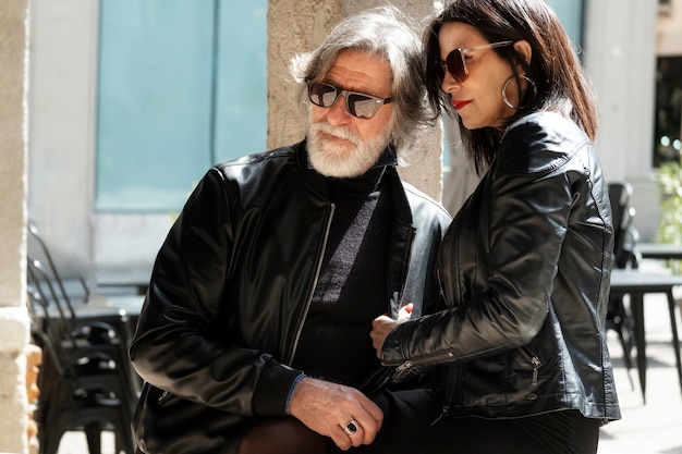 Photo couple wearing synthetic leather clothing