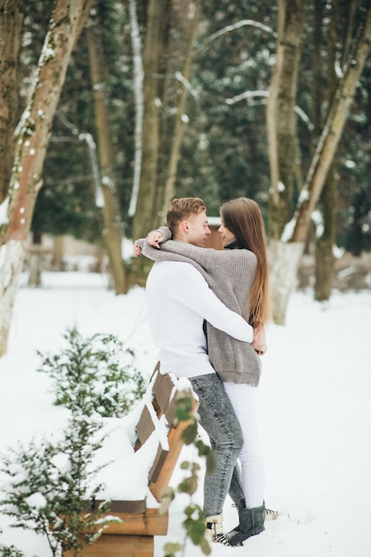 Couple in winter forest