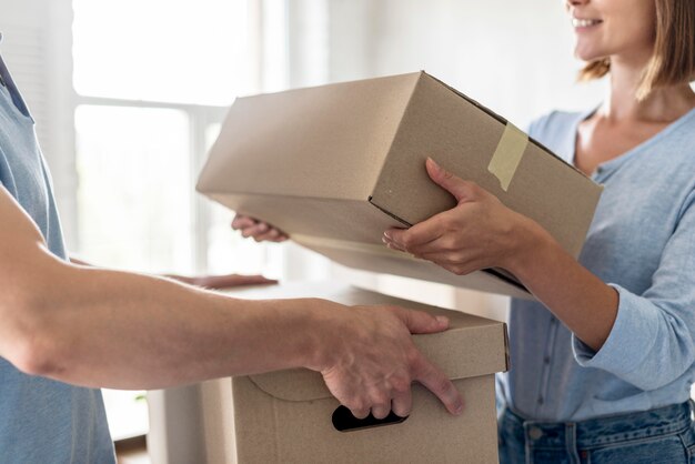 Couple with boxes for moving out day